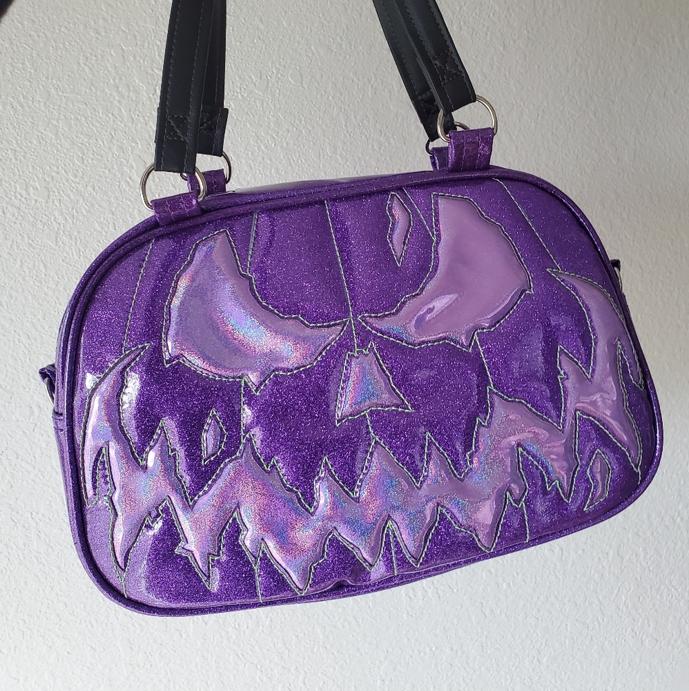 Love pain and stitches purse trade